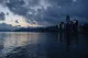 Hong Kong skyline at dusk reflected over Victoria Harbour