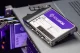 A Solidigm branded NAND flash storage drive on a server rack